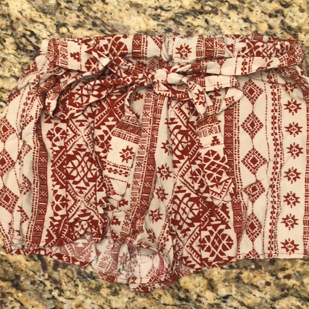 Tan and burnt orange patterned shorts